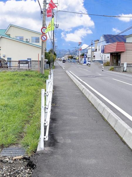 【売土地】北斗市久根別1丁目383番11 前面道路含む現地写真 