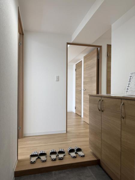 コープ野村南郷アネックス 玄関 